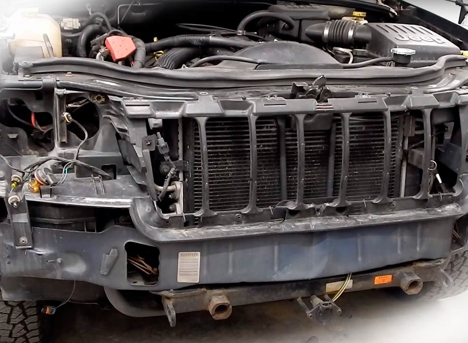 replace radiator overflow tank on jeep cherokee